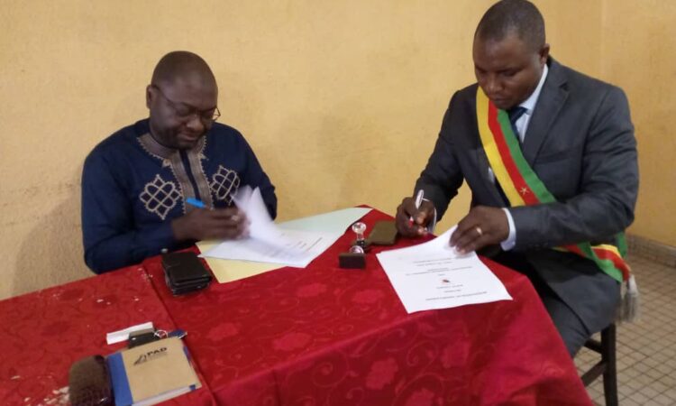 Mayor Ngwakongoh Lawrence of Bafut Council and Mr. Paul Bup of ProLeaders signing an MoU for Business Development and Leadership Training geared towards Bafut Council Staffs and an immediate priority project in renewable energy development (Solar Energy Systems) within Bafut Council Area.