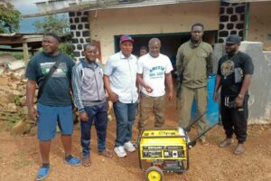 Mayor Ngwakongoh Lawrence donating a high-power generator to the Brigade post in Agyati.